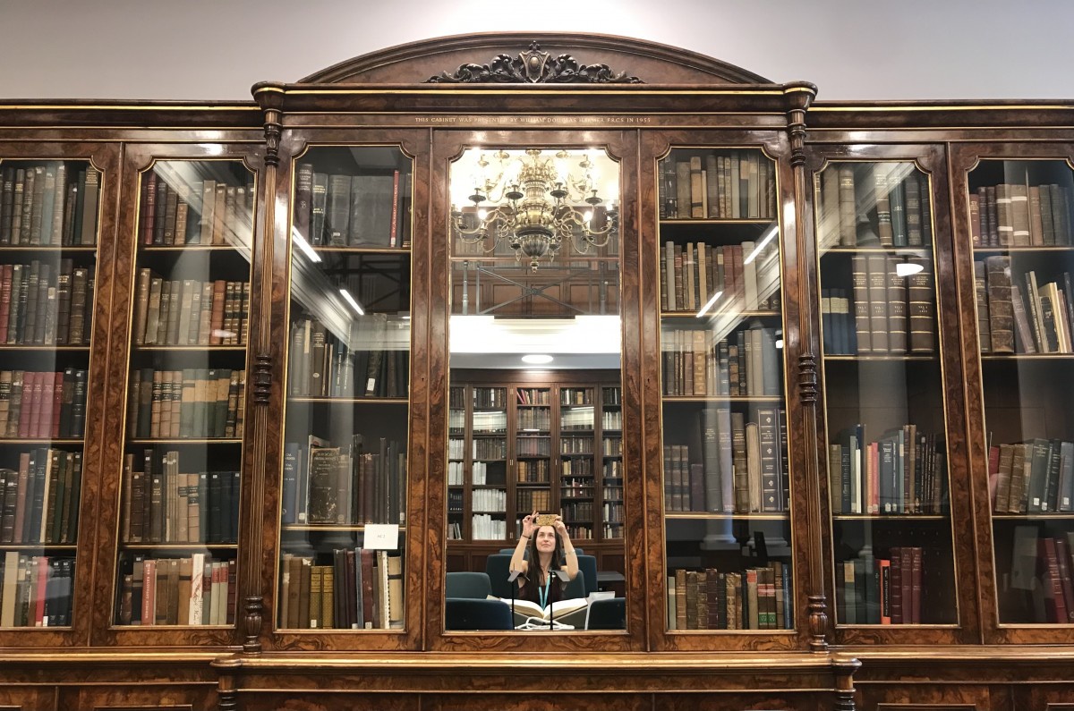 Natalie in her happy place (surrounded by books in a beautiful library). Taken at the Royal College of Surgeons Library in London.