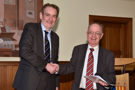 Professor Alex Kemp (right) is congratulated by University Principal, Professor Sir Ian Diamond, on half a century of service to the University of Aberdeen
