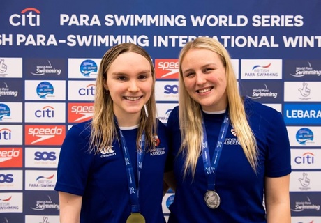 Toni Shaw and Faye Rogers celebrate their top two finish in the 400m freestyle