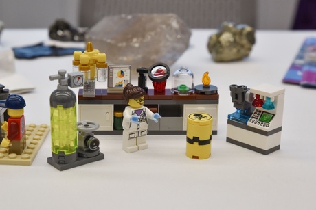 A small lego scientist in a lego laboratory