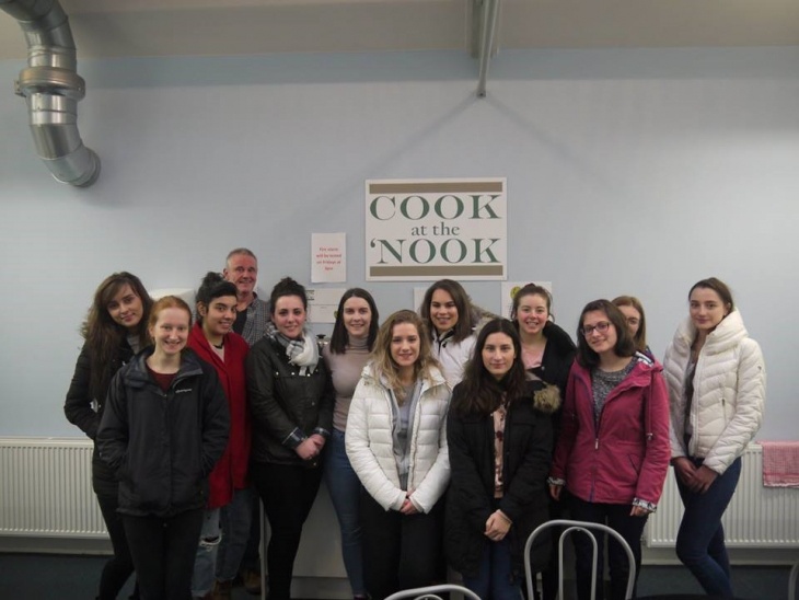 Members of the class photographed with David Simmers in CFINE’s new training kitchen Cook at the Nook.