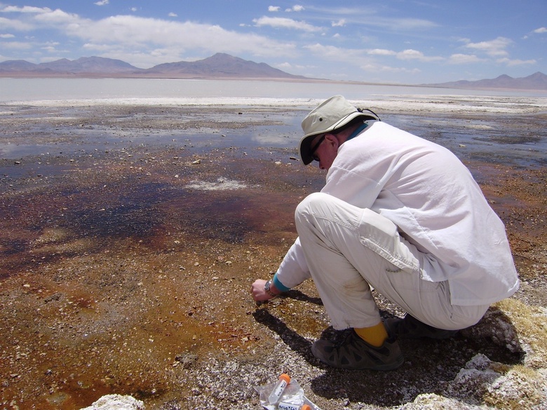 Prof Jaspars sampling a salt lake in the Atacama desert