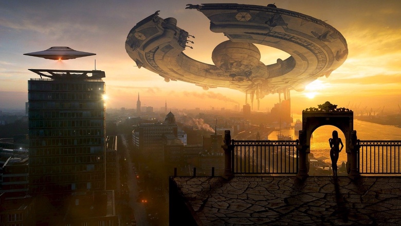 Fantasy image showing a giant spaceship hovering over a cit. The backdrop is a golden and blue sunset.