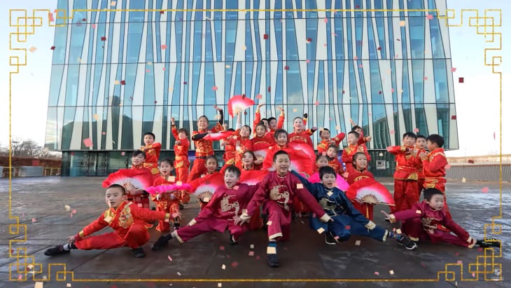 group of chinese children outside library