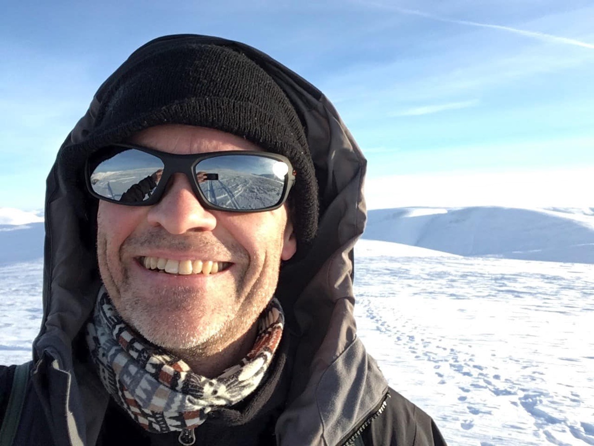 Man with glasses in snow