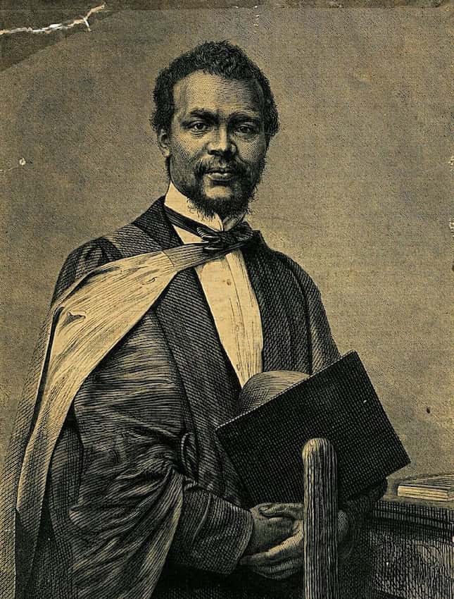 portrait of student in gown with books