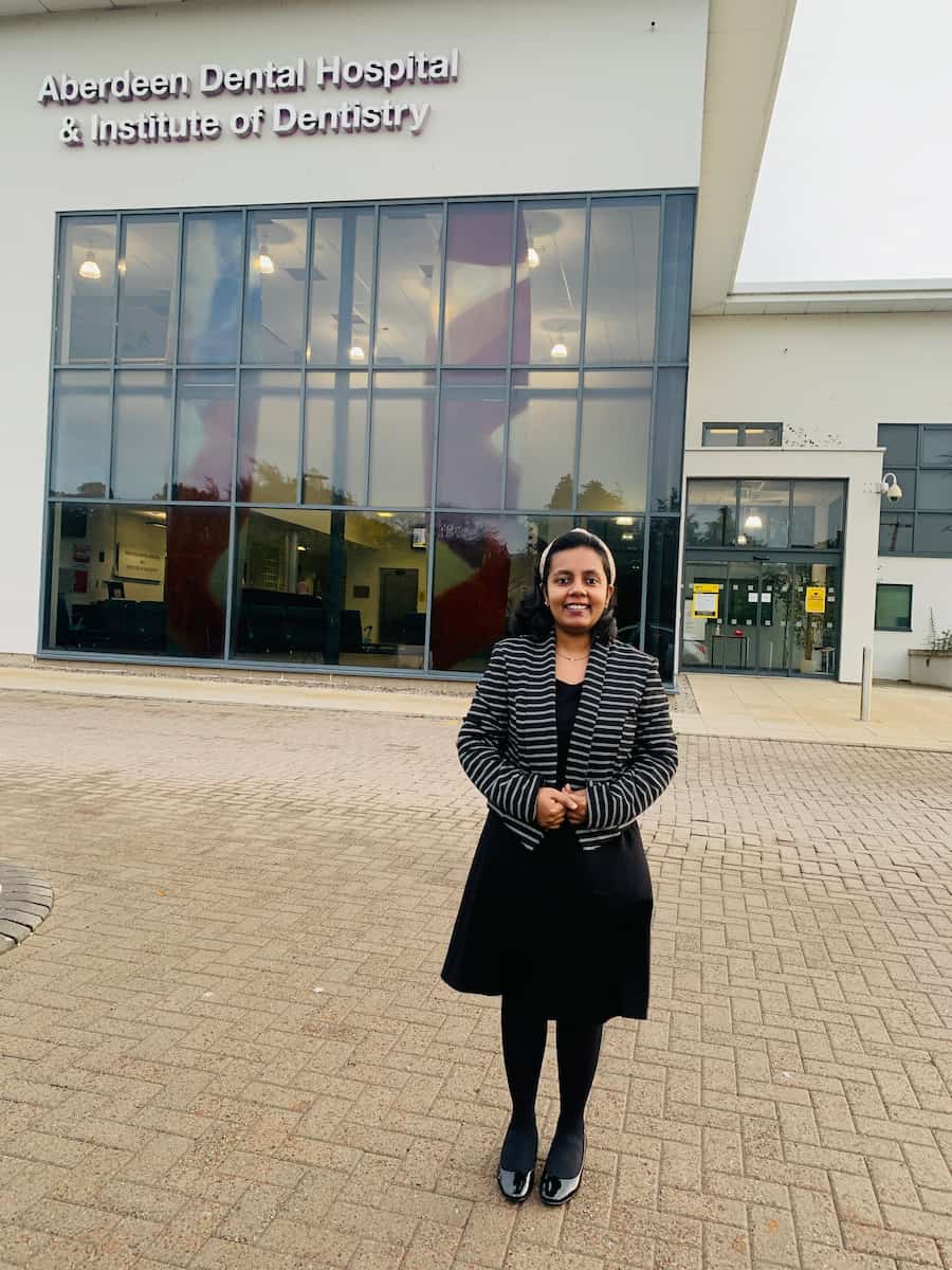 woman outside building