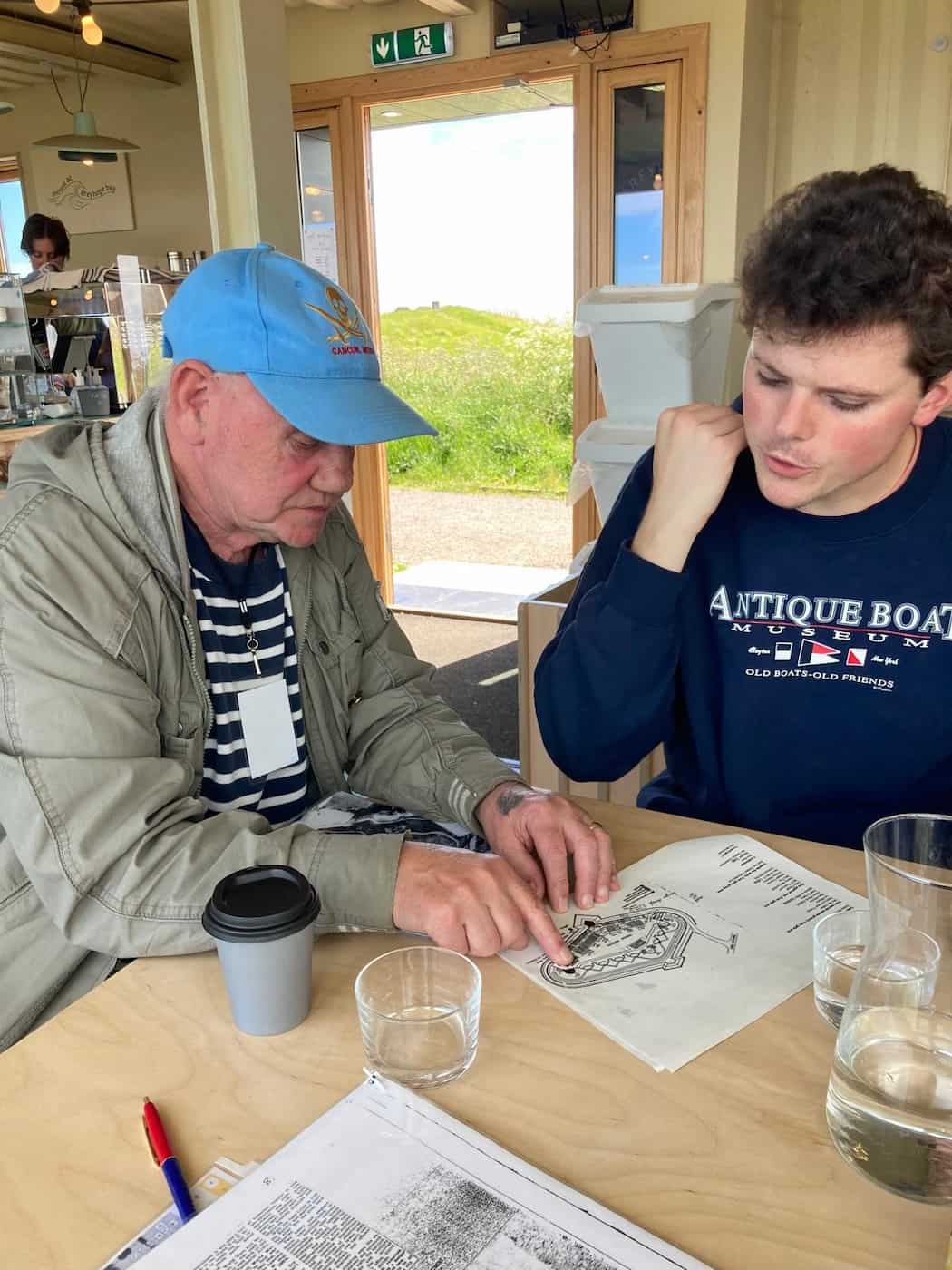 two men looking at document