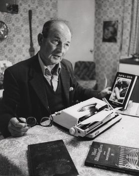David Toulmin at his typewriter