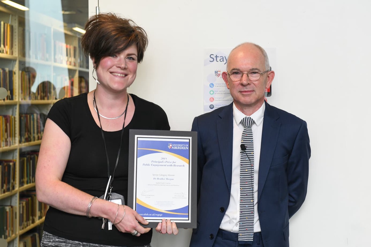 lady with principal of uni