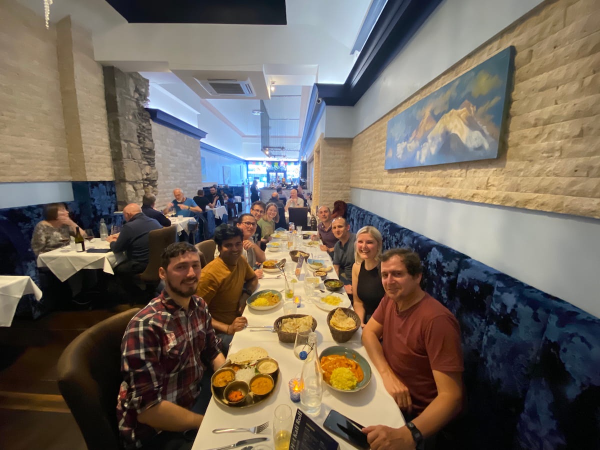 group having meal in restaurant