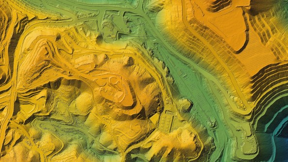 a digital rendering of a subsurface map in green, yellow and orange