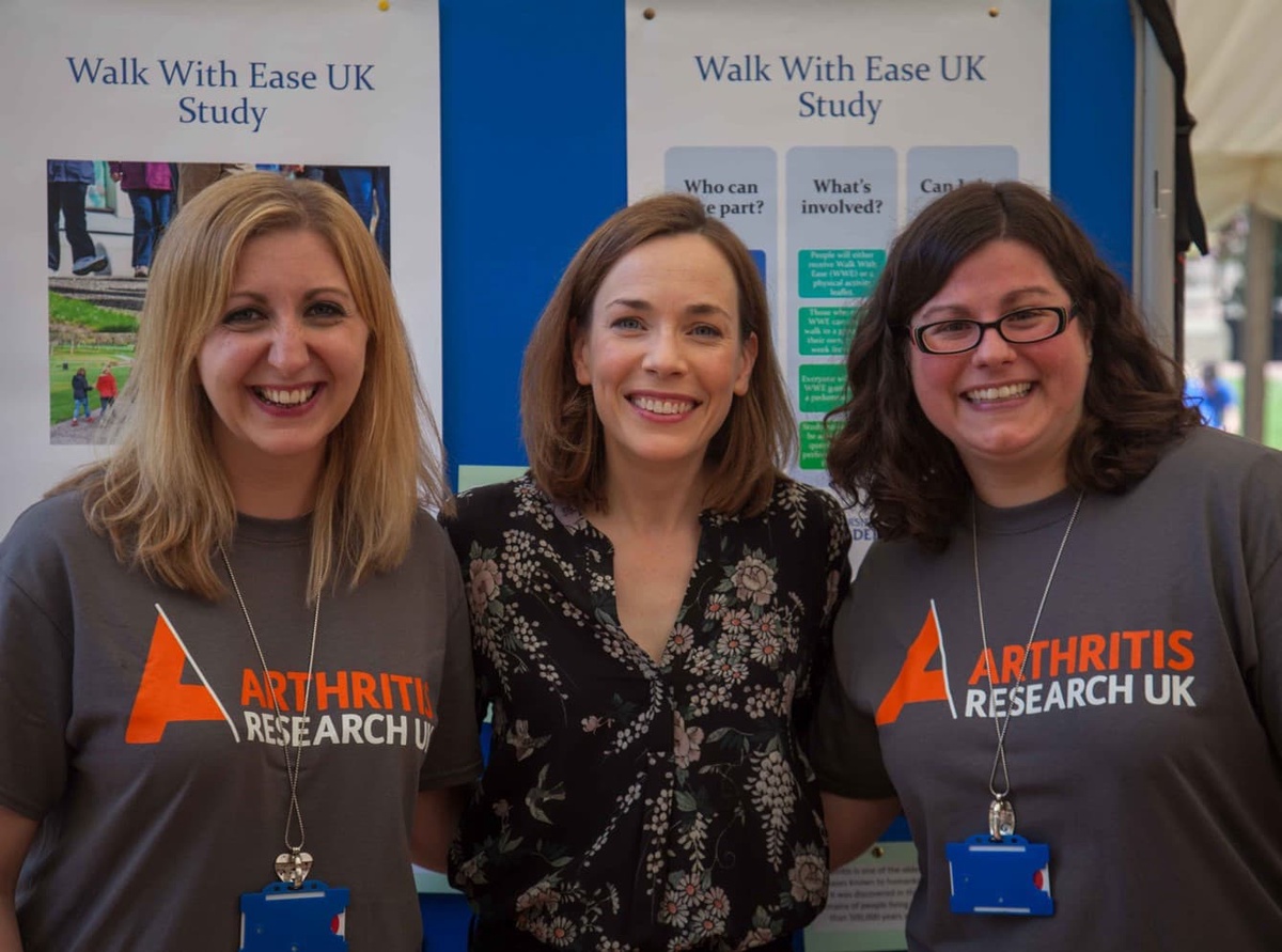 2 arthritis research uk workers with actor Laura Main