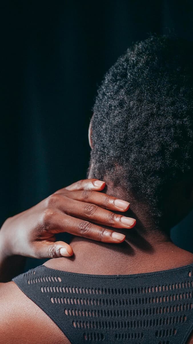 woman with sore shoulder