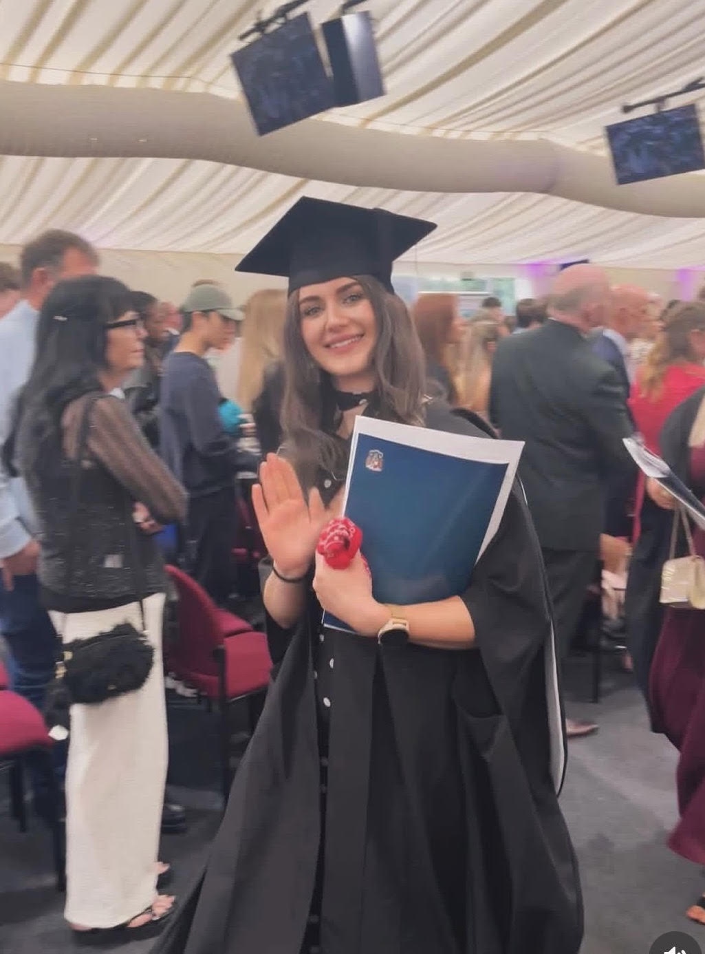 A graduate at a graduation ceremony