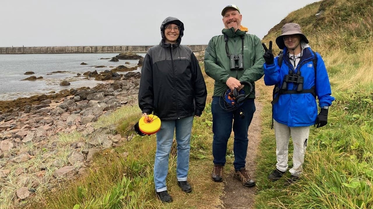 Workshop participants carrying out field recording activities at Greyhope Bay in Aberdeen (Project: Just Reverberations, 2025)