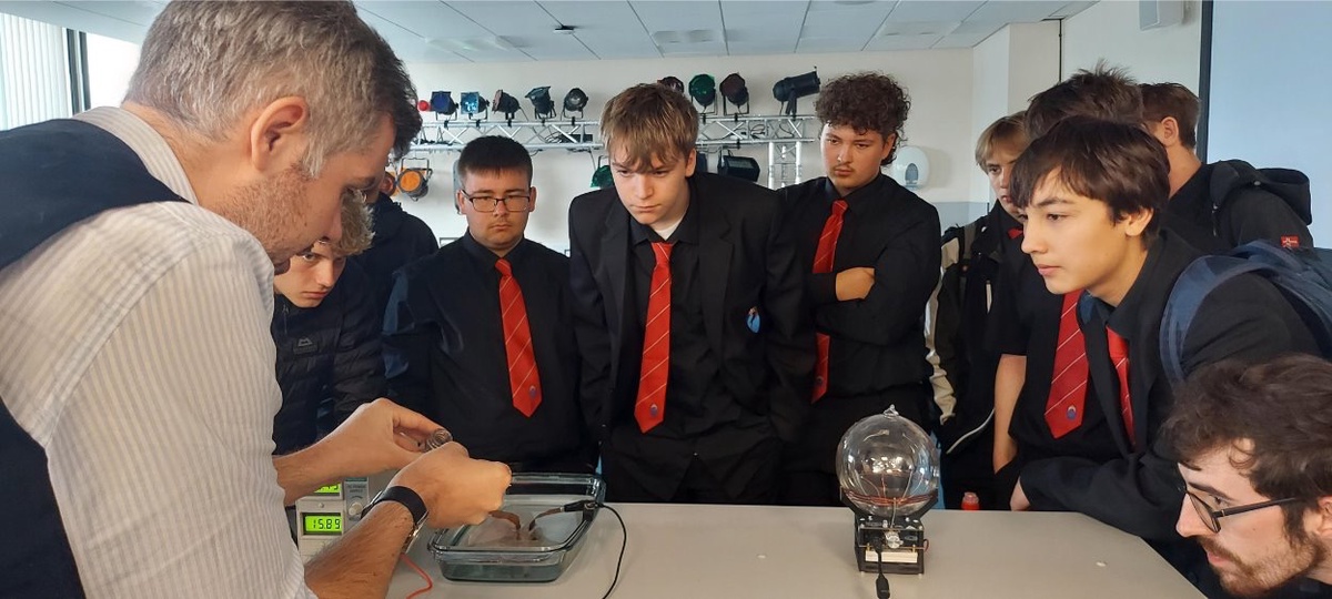 A group of school pupils watch Dr Scott Doyle do a plasma demonstration at the Department of Physics S5/S6 experience day on 12 September 2025. Image: Dr Kapil Debnath