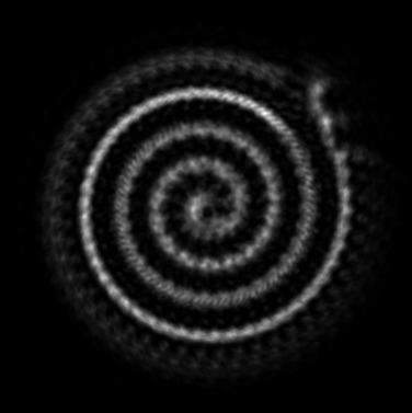 A spiral laser beam produced by passing a laser beam through a spatial light modulator showing a computer-generated phase pattern, which changes the phase of the beam. Image: David McGloin