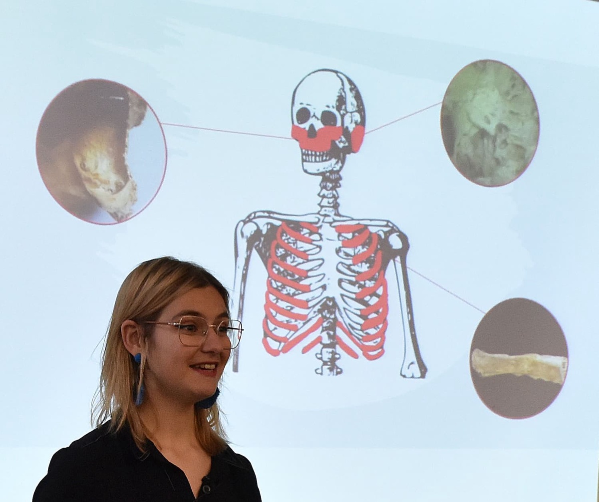 female student in front of a screen