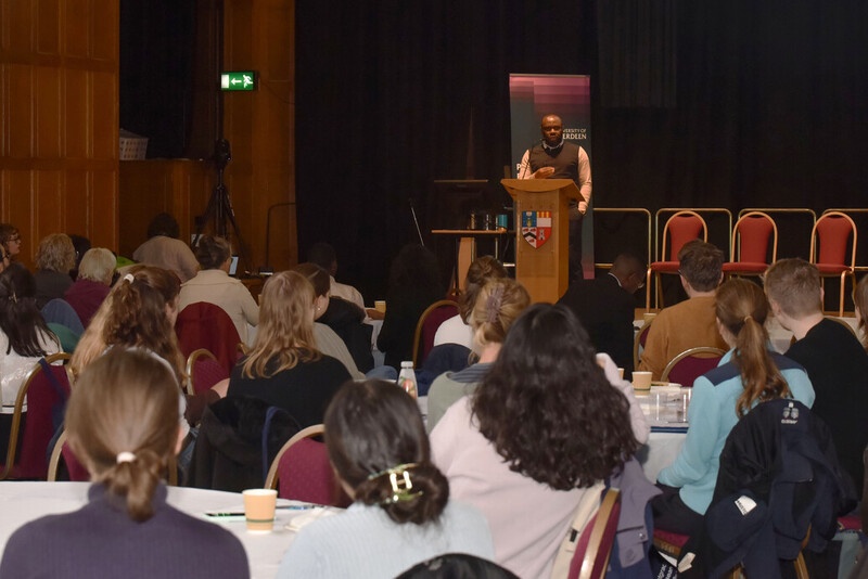Dr Eddy Wifa Delivering Q&A Keynote during PGR Orientation in front of sitted audience