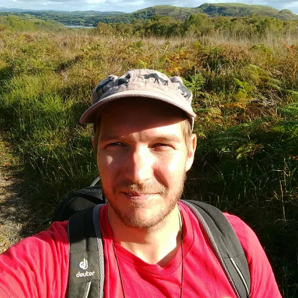 happy man in red shirt