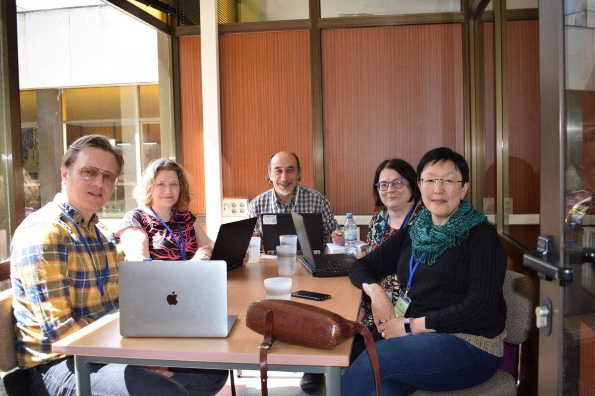 people around a desk