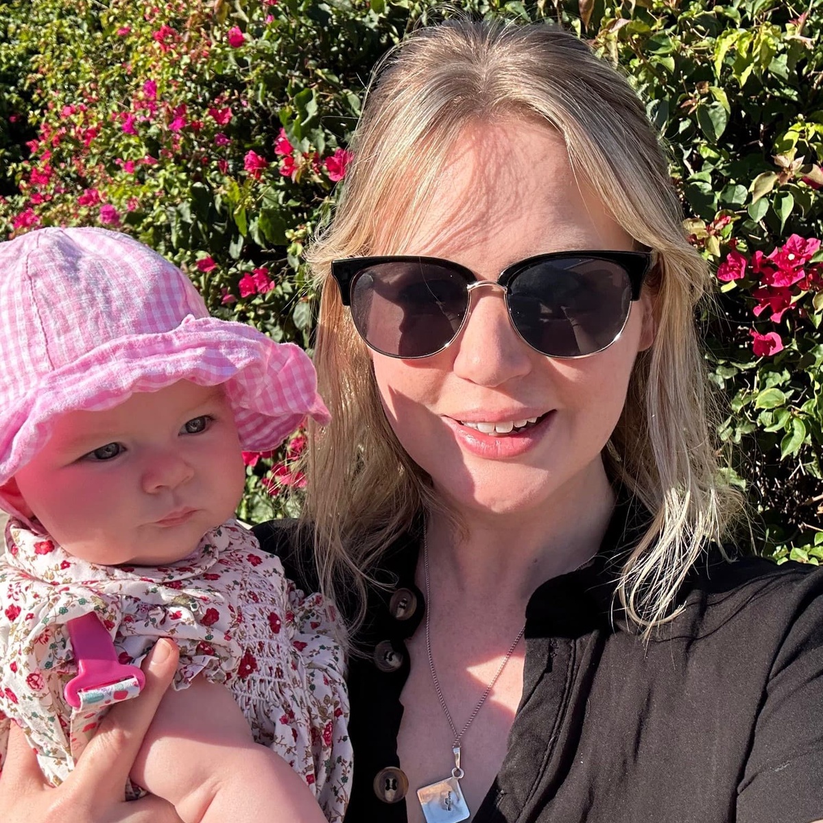 Alex holding baby Cassie