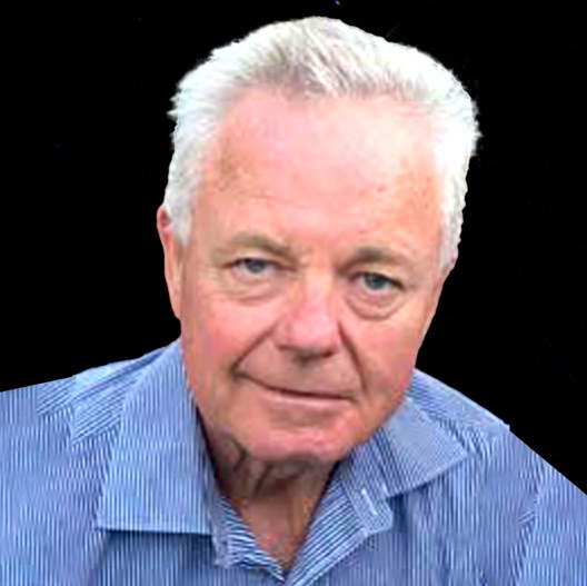 Photo of main head and shoulderd against black background