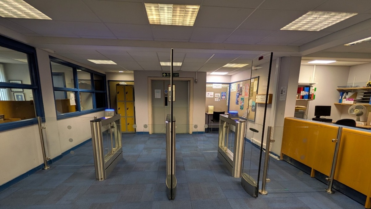 Image shows the entrance of Taylor Library with the new gates