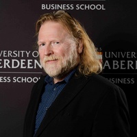 Professor John Skåtun