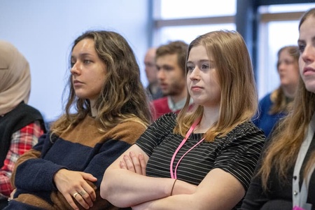 Postgraduate research students at a symposium