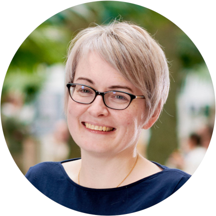 A profile photo of Dr Rosemary Hollick on a blurred green background.