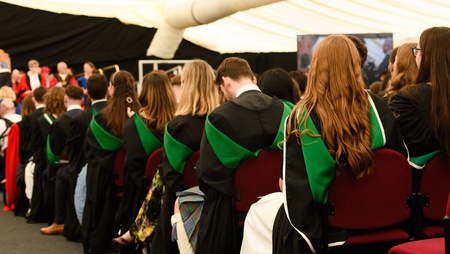 Graduates sitting at their ceremony