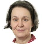 Woman with short brown hair, in red polka dot shirt in front of white backdrop
