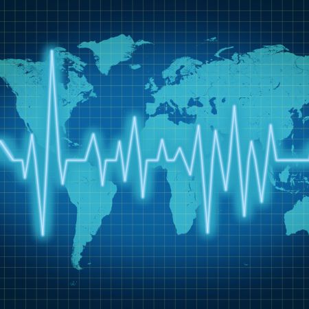 A world map with heart rate monitor across it