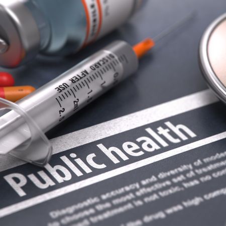 A needle and text saying Public Health