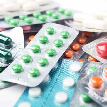 Colourful pills in packets