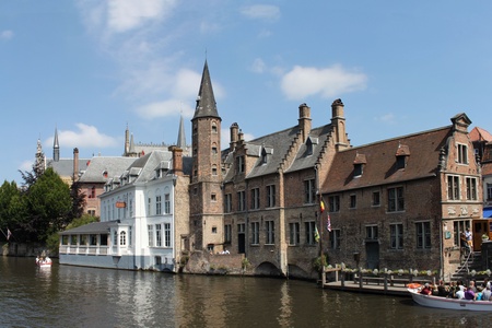 Old buildings on a river in Brugges