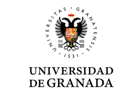 University crest with text reading 'University of Granada' in Spanish