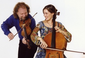 Man playing fiddle and woman playing cello.