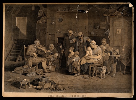 A blind fiddler plays to a family audience