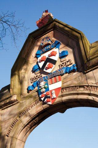University crest on entrance to King's College
