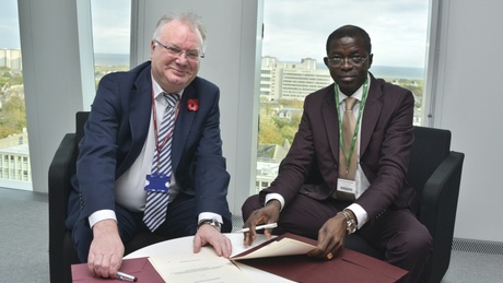 Senior Vice-Principal Professor Stephen Logan (left) and Gabon's Minister of Education Seraphin Moundounga