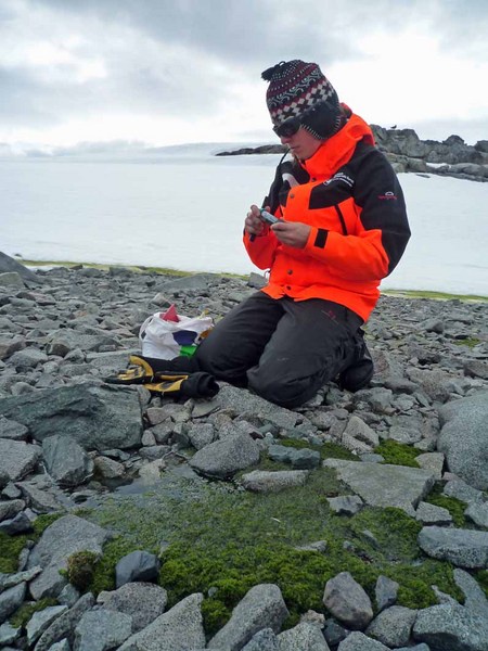 Julia Kleinteich, University of Konstanz, taking a sample on Anchorage Island