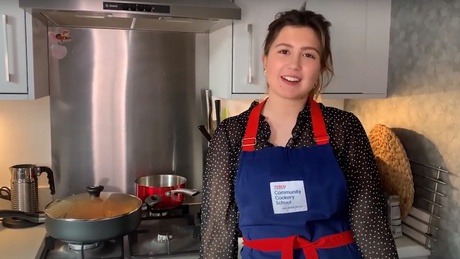 Anna Kebke in her kitchen demonstrating the recipes