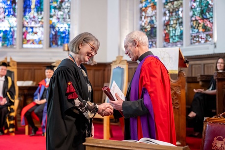 University Secretary and Chief Operating Officer, Tracey Slaven (left) and the Archbishop of Canterbury the Most Reverend Justin Welby shaking hands