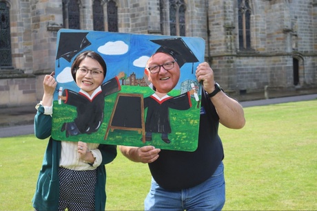 Artist Nan Liu and Graham Norrie with the photo board at the Old Aberdeen campus