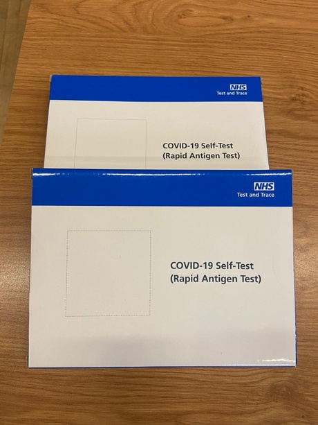 Image shows two Covid-19 test kits