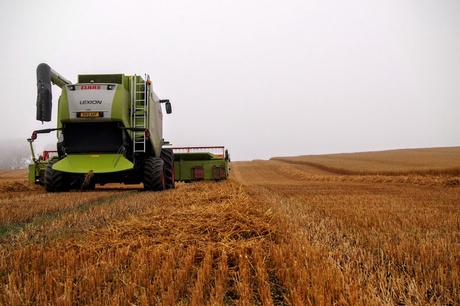 Combine harvester working in a field