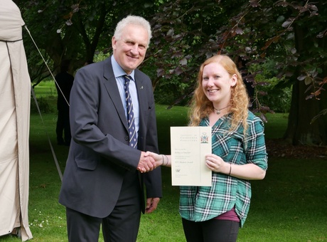 Rebecca receives her certificate from ICF member and Chartered Forester Chris Piper